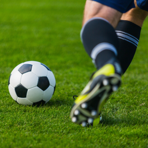 Soccer ball and player football sports field line marking paint